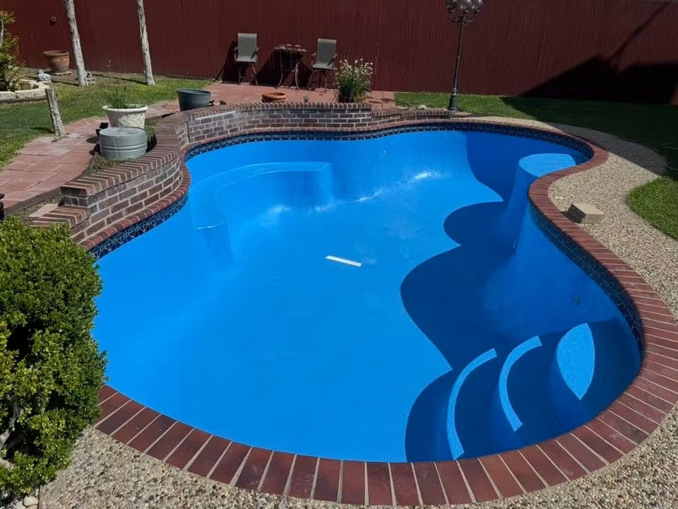 Sparkling clean pool with natural rock after Alien210 cleaning